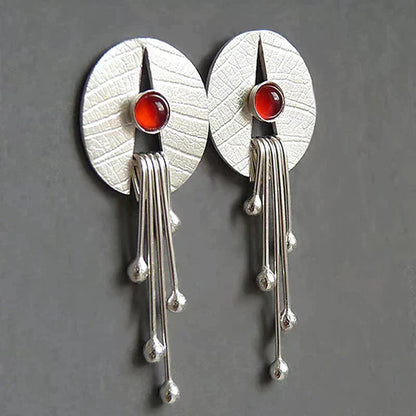 Boucles d’Oreilles Longues Pendantes Ornées d’une Pierre Rouge