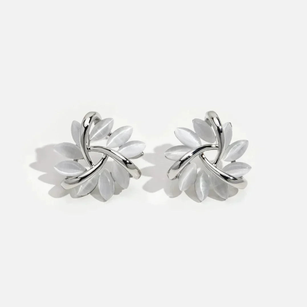 Boucles d’Oreilles Raffinées en Or et Argent Style Clous